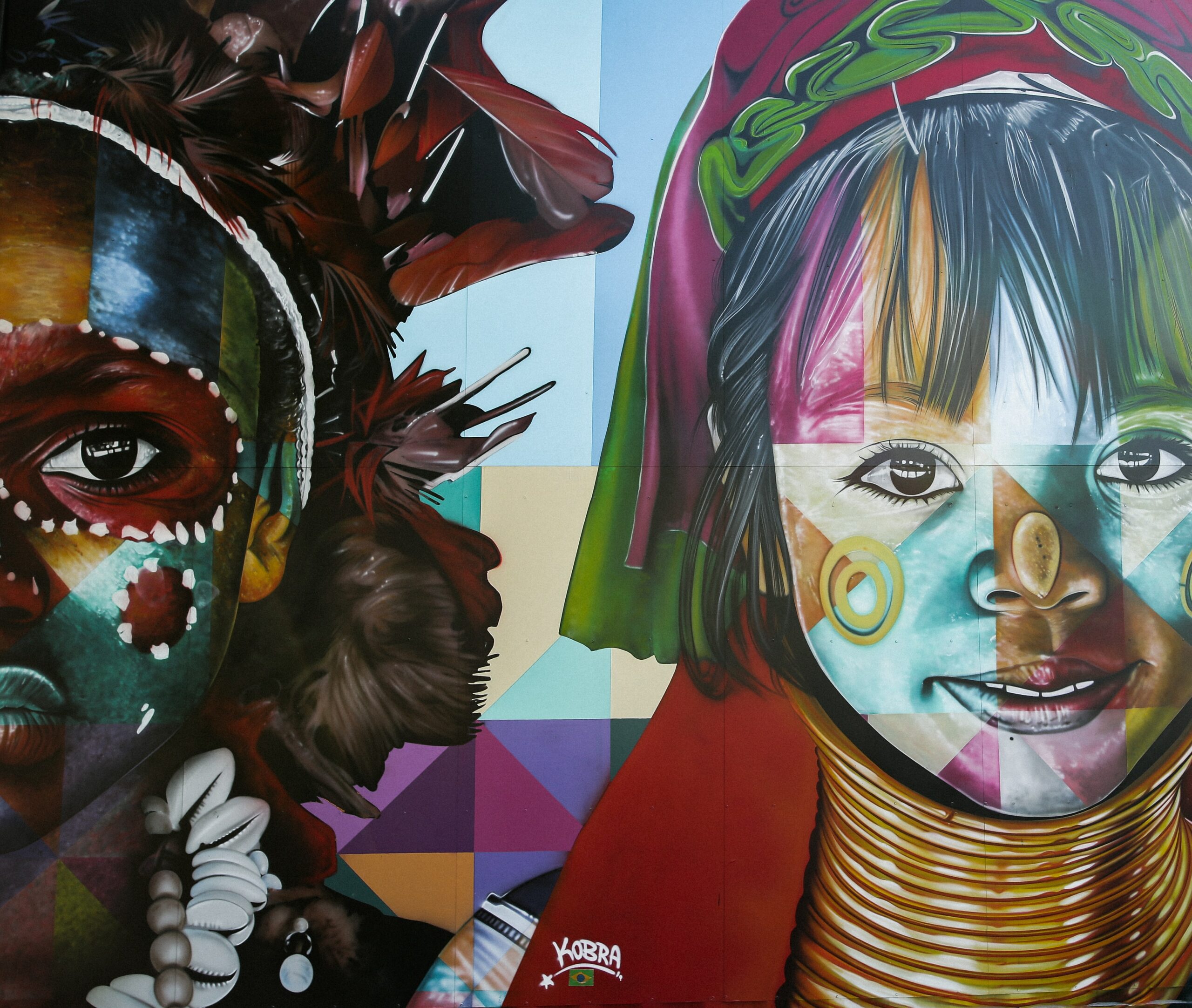Colorful multicultural wall mural by artist Kobra